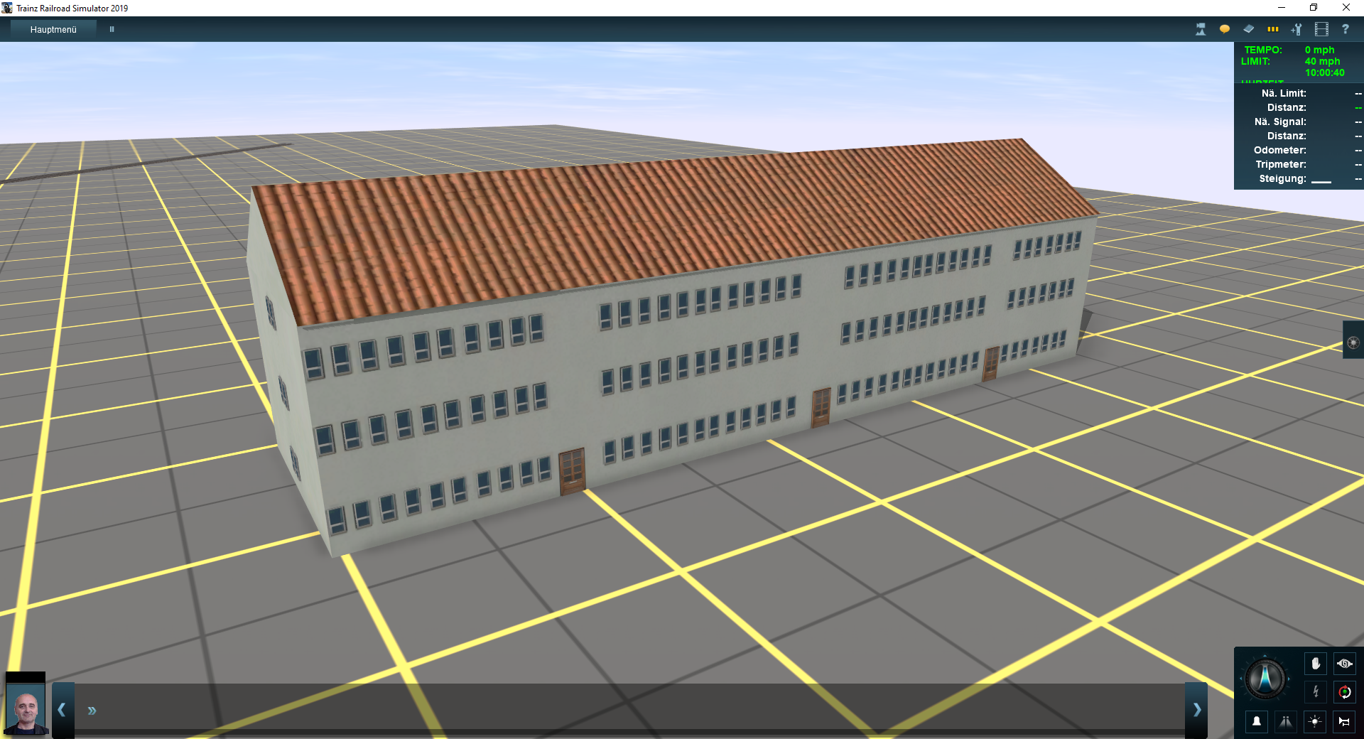Screenshot von Trainz. Ein Reihenhaus steht in einer leeren Landschaft.